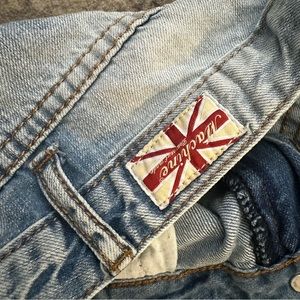 Great use condition women’s Machine Jeans distressed relax fit jeans. No stains.